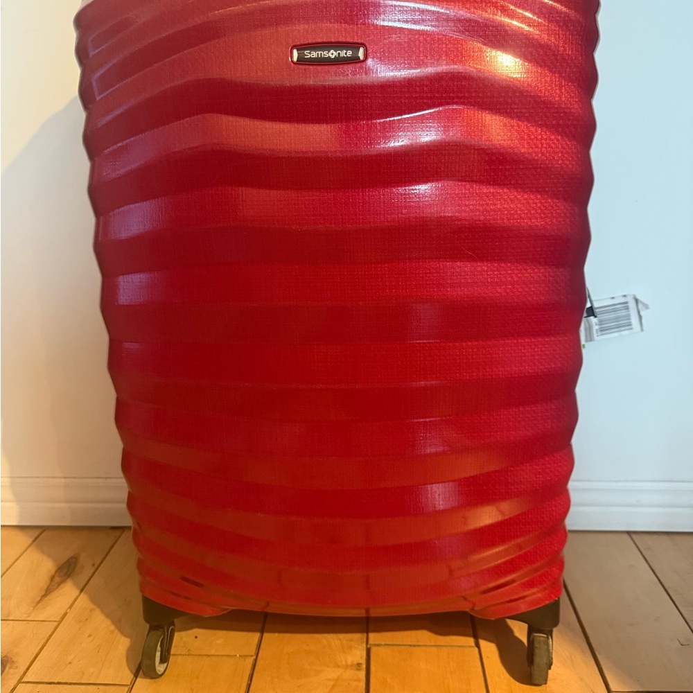 Vibrant Red Rolling Storage Bin with Durable Design and Glossy Finish